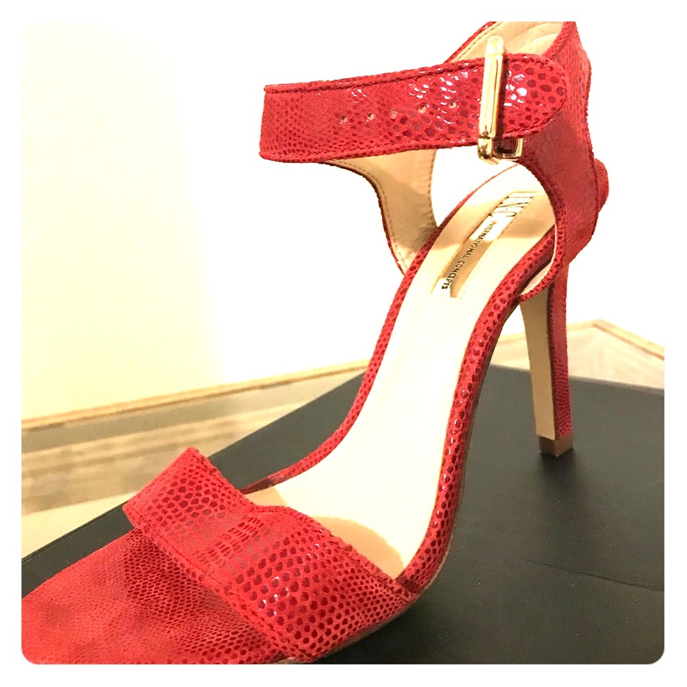 Brand new! Snakeskin Designer Heels